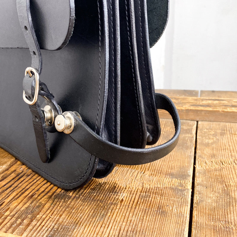 Sacoche cartable double de vélo en cuir noir