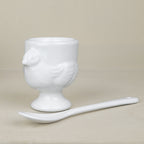 Set de 4 coquetiers et petite cuillère en porcelaine