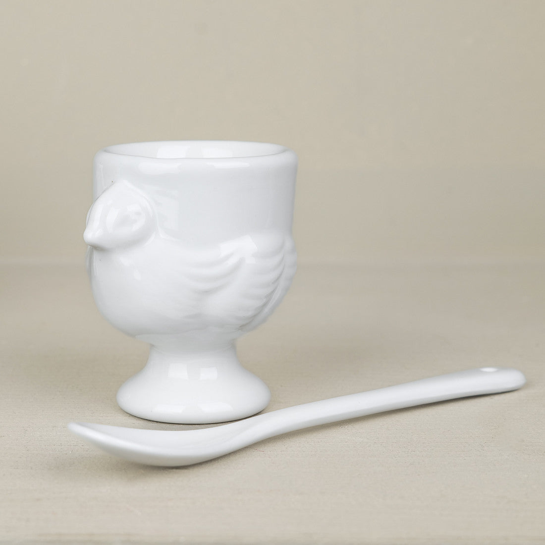 Set de 4 coquetiers et petite cuillère en porcelaine