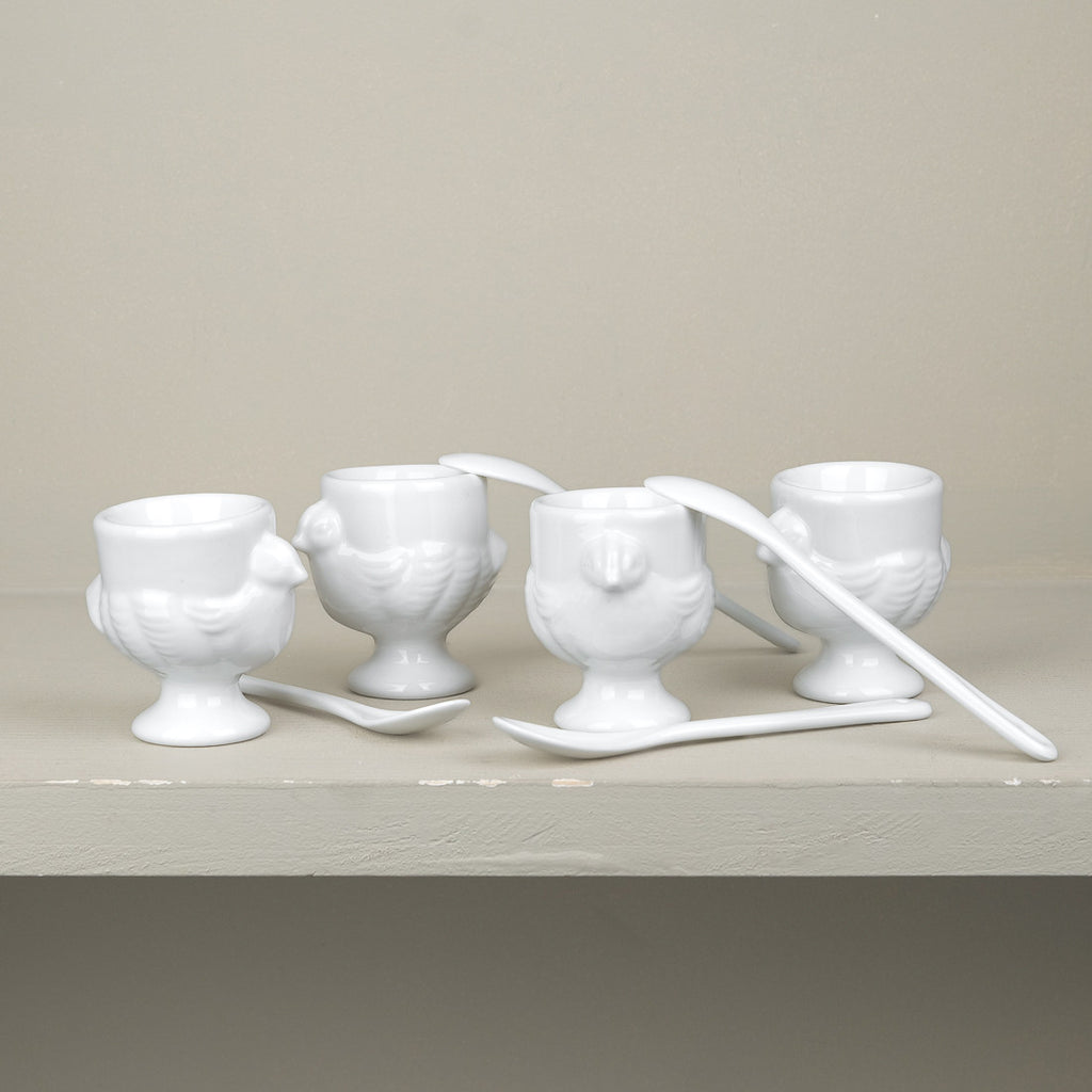 Set de 4 coquetiers et petite cuillère en porcelaine