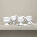 Set de 4 coquetiers et petite cuillère en porcelaine