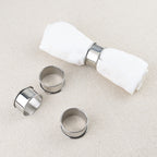 Set de 4 ronds de serviettes en inox
