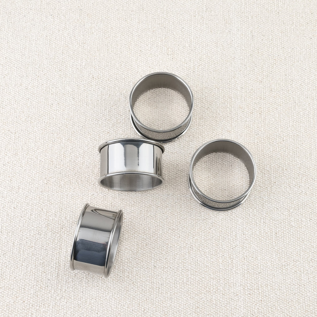 Set de 4 ronds de serviettes en inox