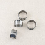 Set de 4 ronds de serviettes en inox