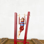 Singe acrobate en bois