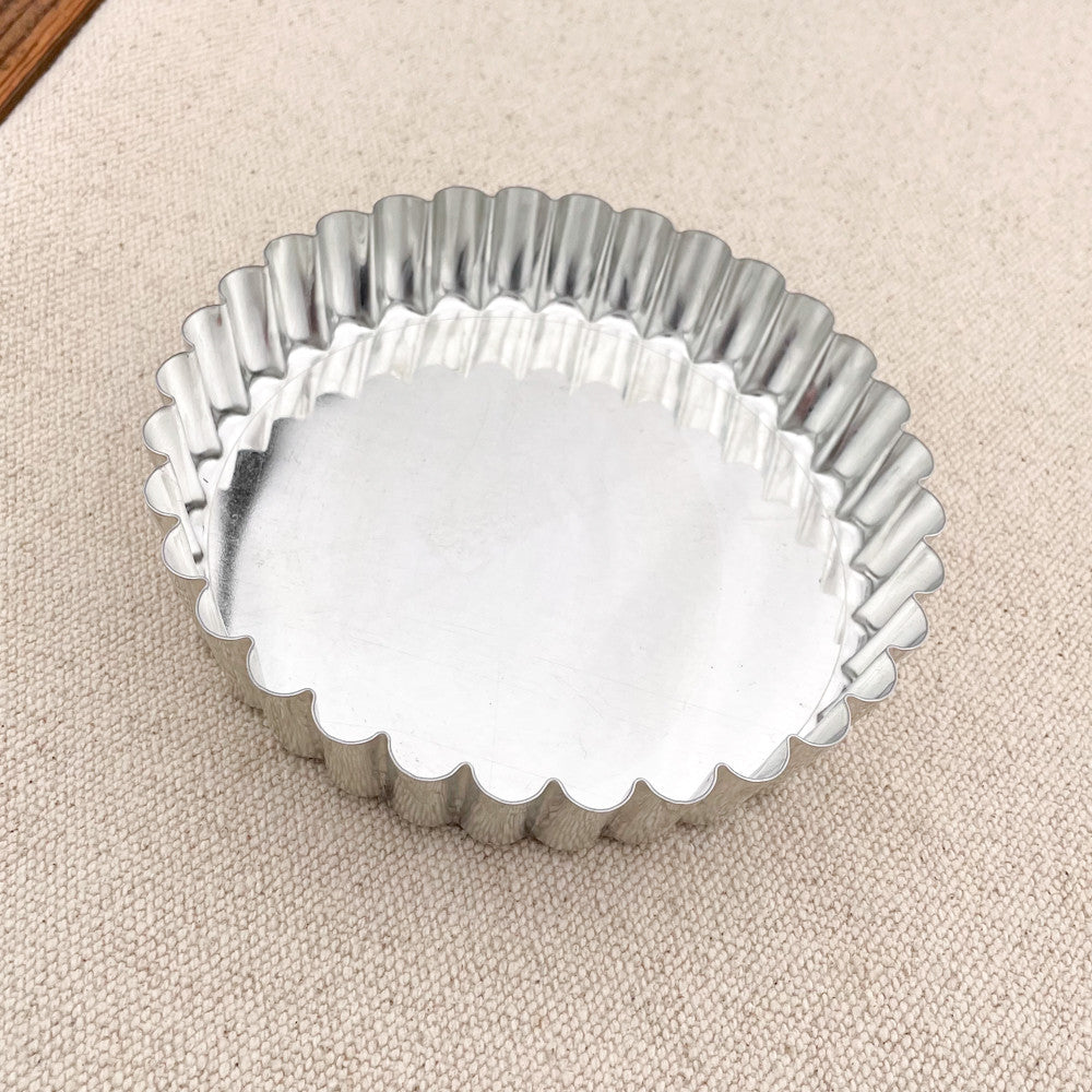 Tartelette en fer blanc à fond mobile