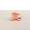 Tasse à café et soucoupe en émail