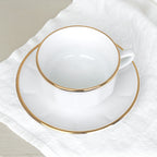 Tasse et soucoupe blanche filet or