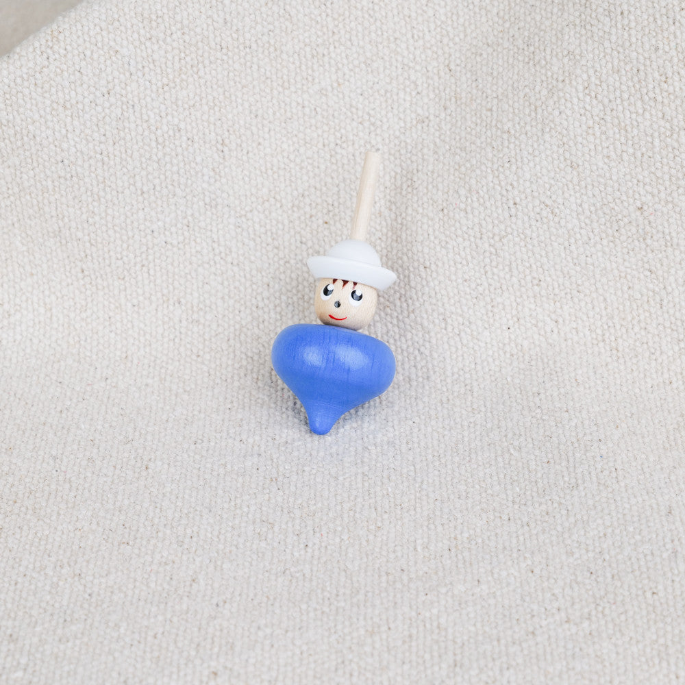 petite toupie en bois bleue
