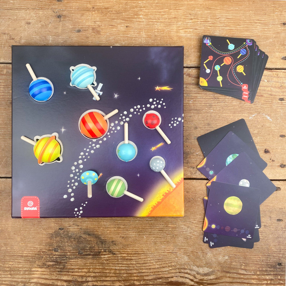 Toupies planète en bois