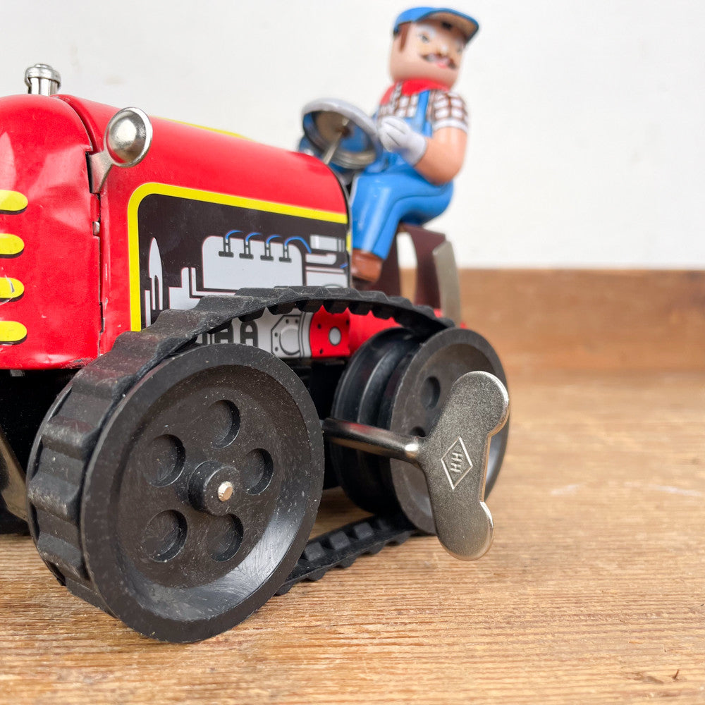 jouet mécanique Tracteur rouge et son chauffeur