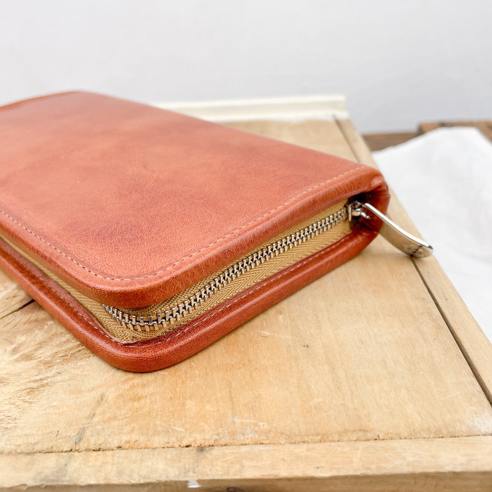 Trousse en cuir naturel