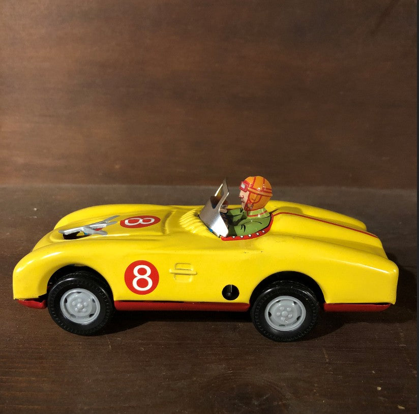 Voiture de course métal jaune