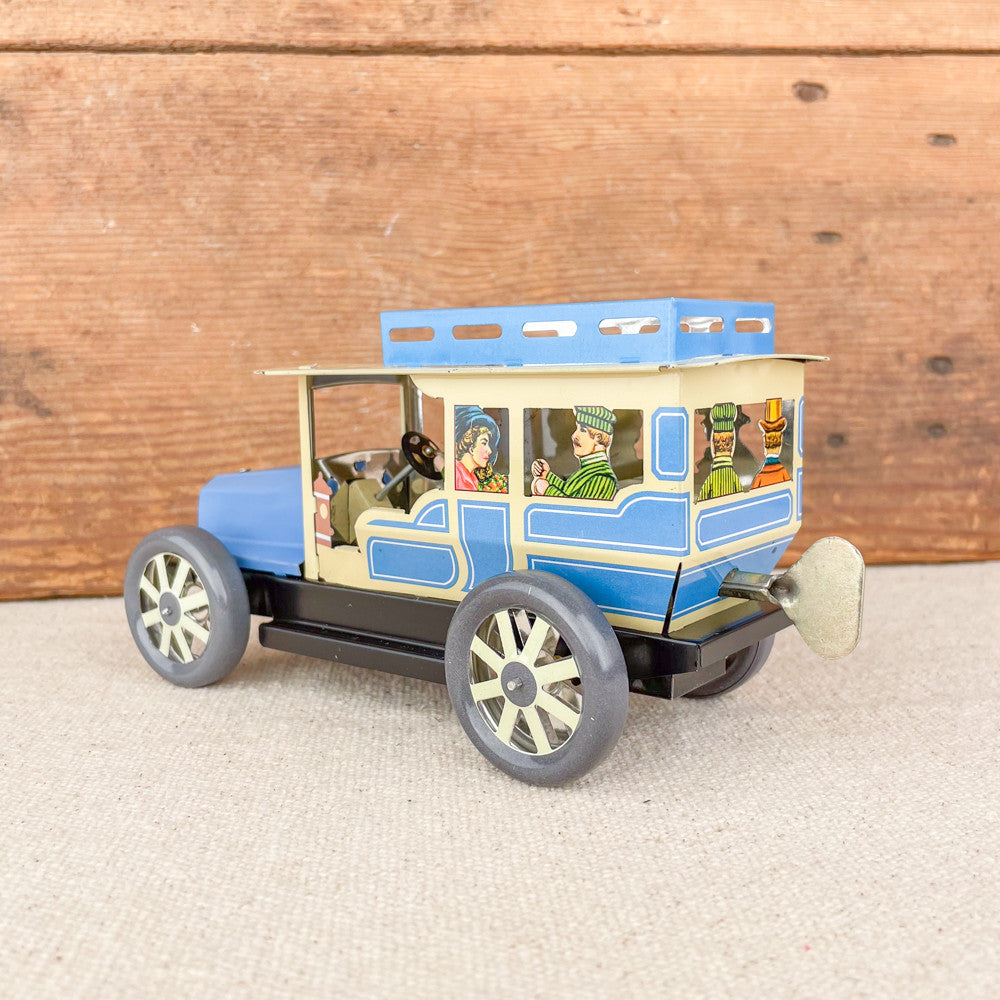 Voiture limousine beige et bleue mécanique